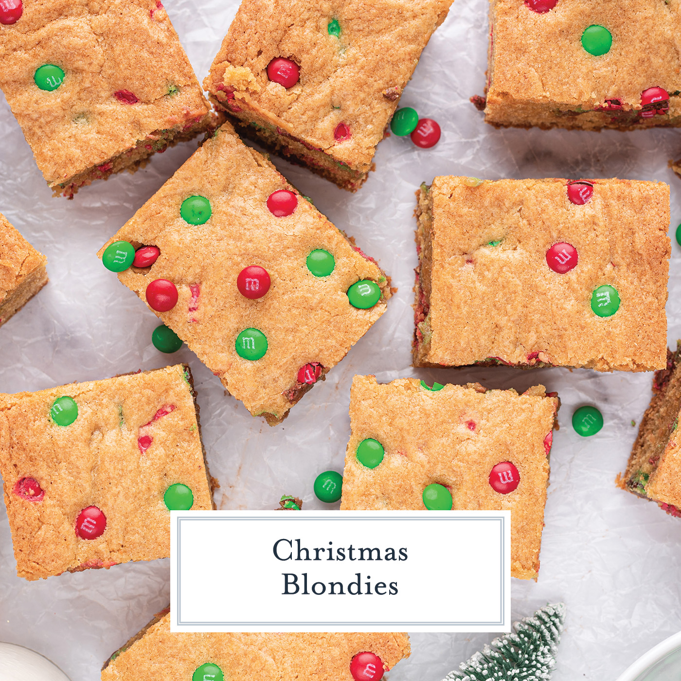 overhead shot of cut christmas blondies with text overlay for facebook