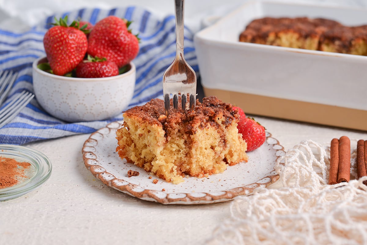 straight on shot of fork in cinnamon sugar biscuit