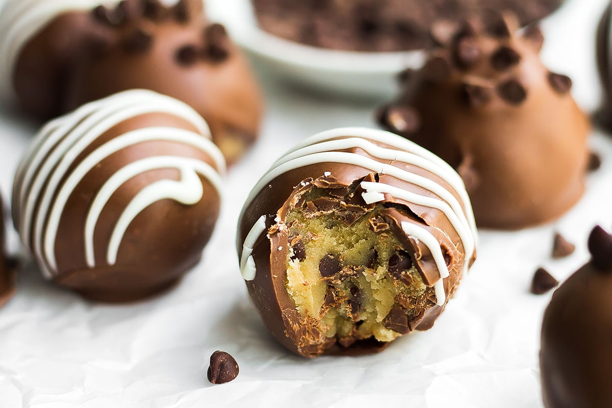 cookie dough truffle with a bite taken out