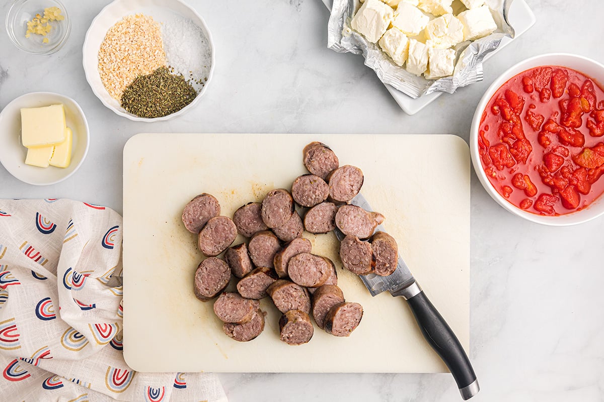 cut sausage on a cutting board