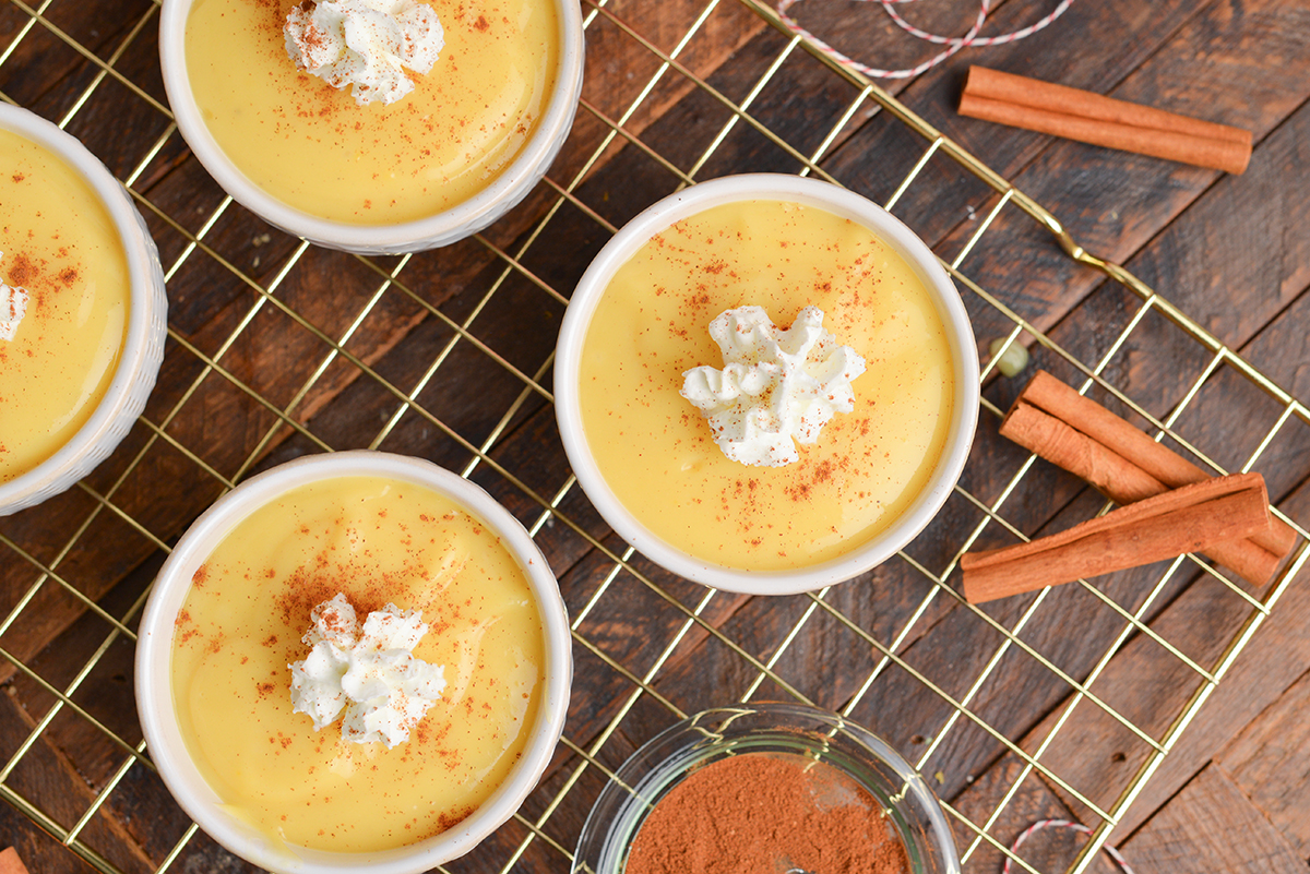 overhead shot of bowl of eggnog pudding on wire rack