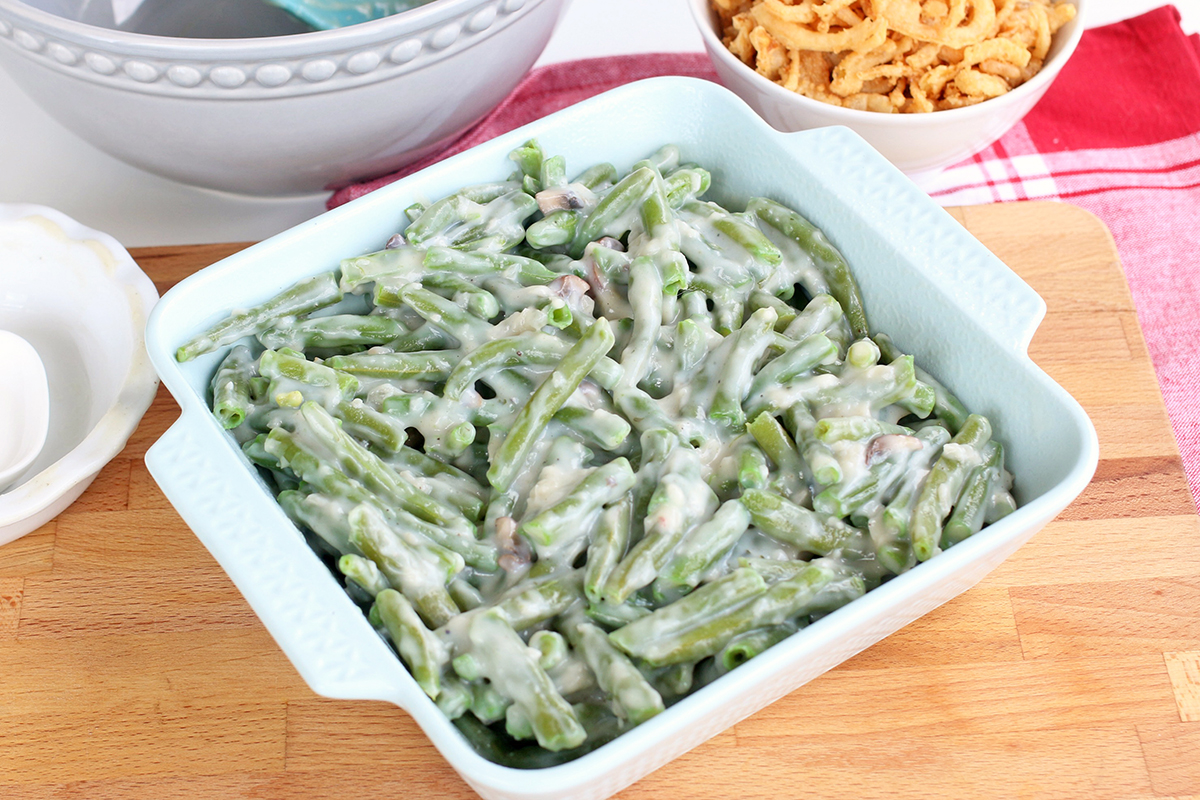 Green bean casserole in a white serving dish