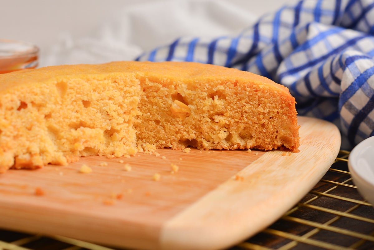 straight on shot of slice taken out of instant pot cornbread