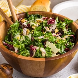 angled shot of bowl of kale salad