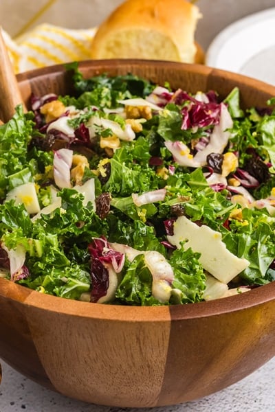 angled shot of bowl of kale salad