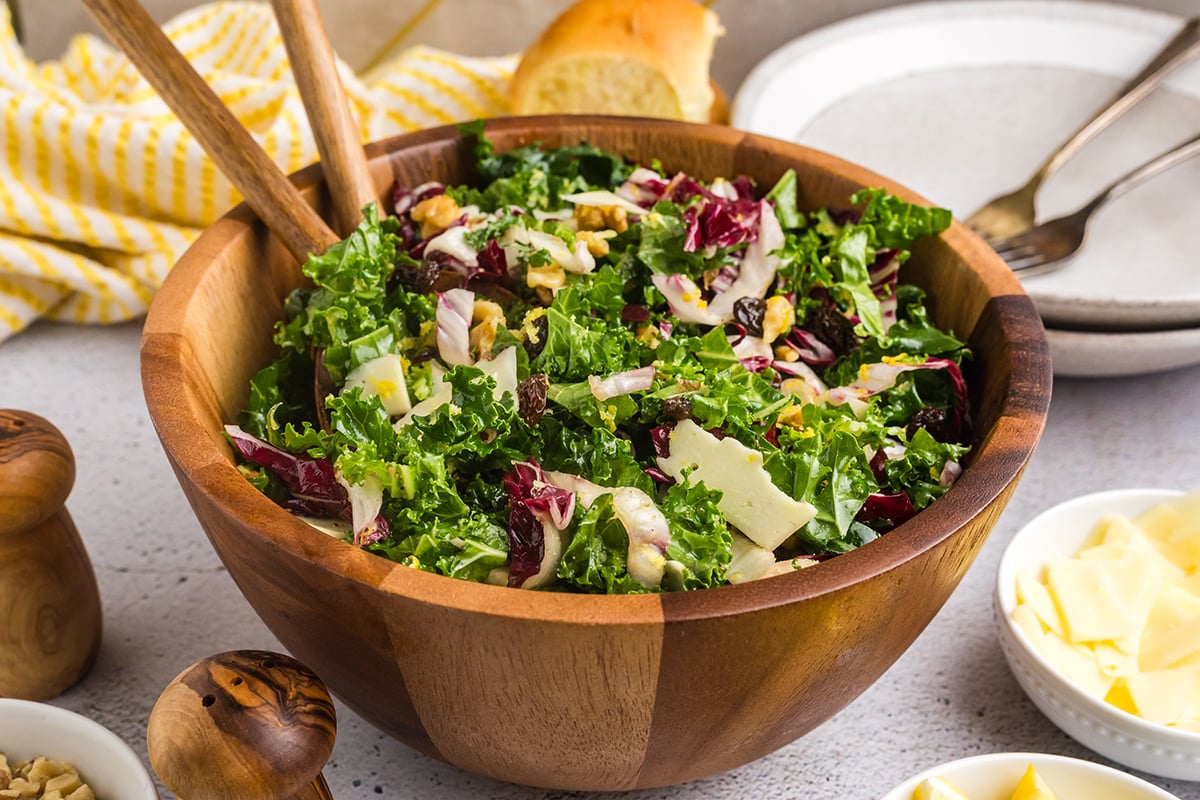 angled shot of bowl of kale salad