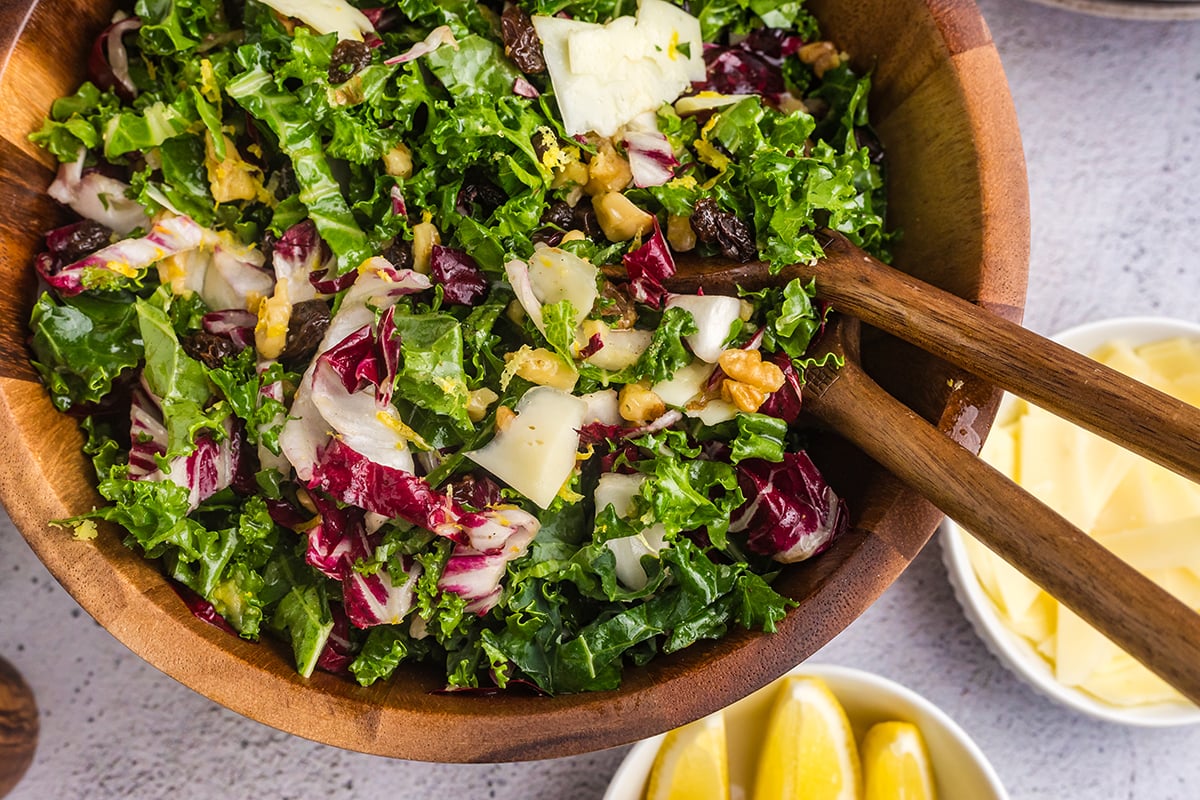 half overhead shot of bowl of kale salad