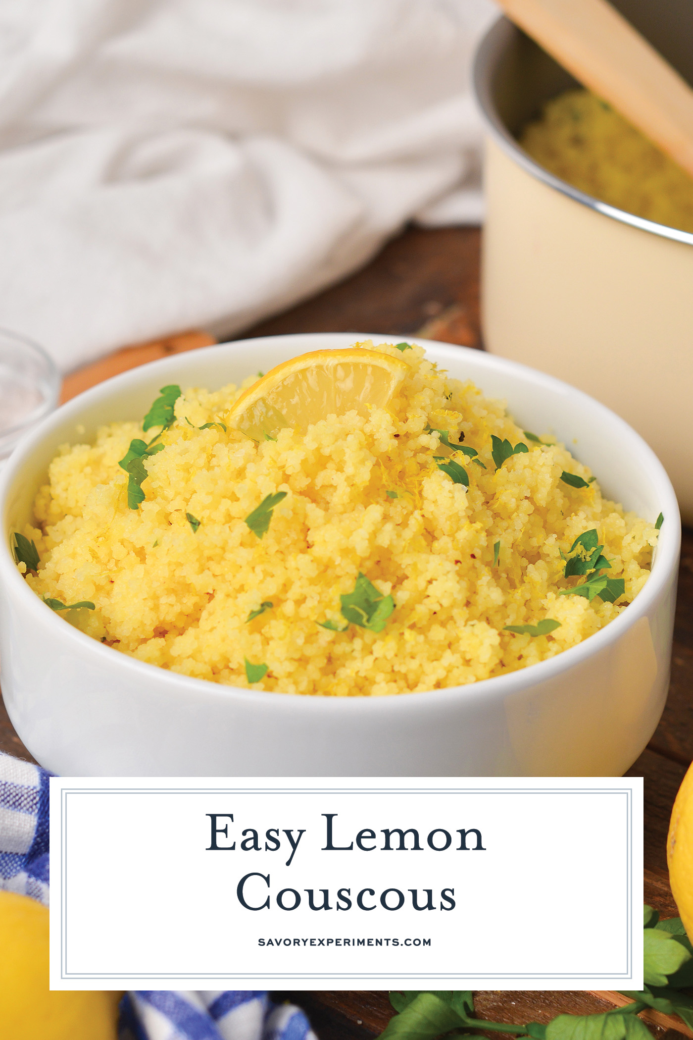 angled shot of bowl of lemon couscous with text overlay for pinterest