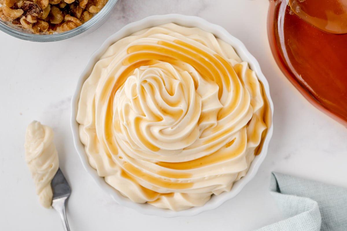 overhead maple cream cheese frosting with maple syrup drizzle