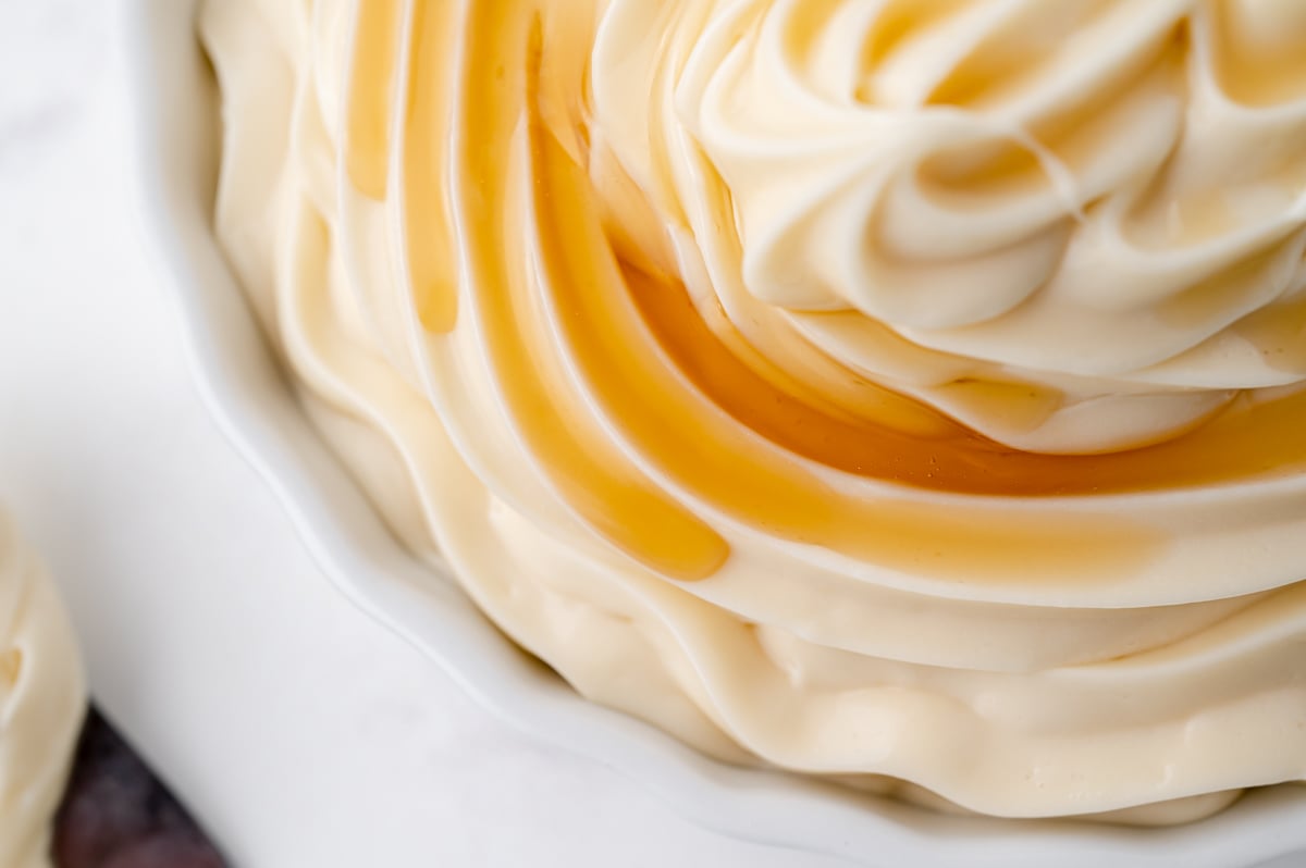 close up of maple syrup on frosting