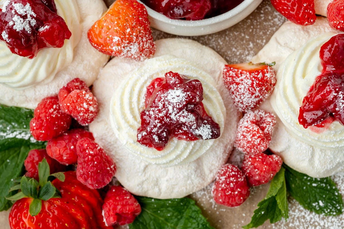 close up overhead shot of meringue topped with berries