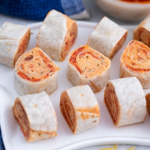 overhead shot of tray of pizza pinwheels