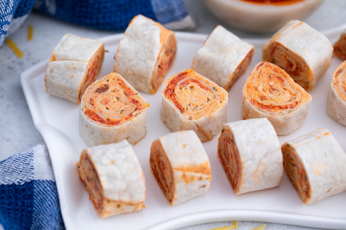 overhead shot of tray of pizza pinwheels