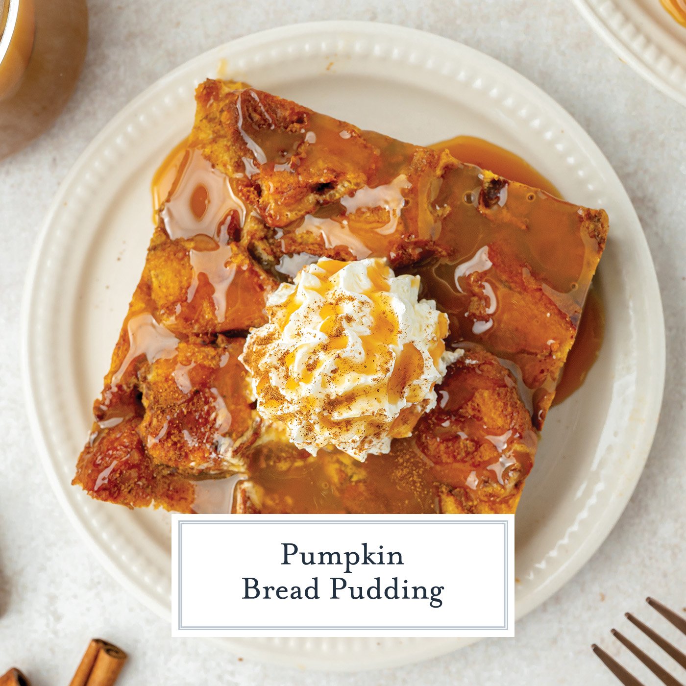 overhead shot of slice of pumpkin bread pudding topped with whipped cream and caramel with text overlay for facebook