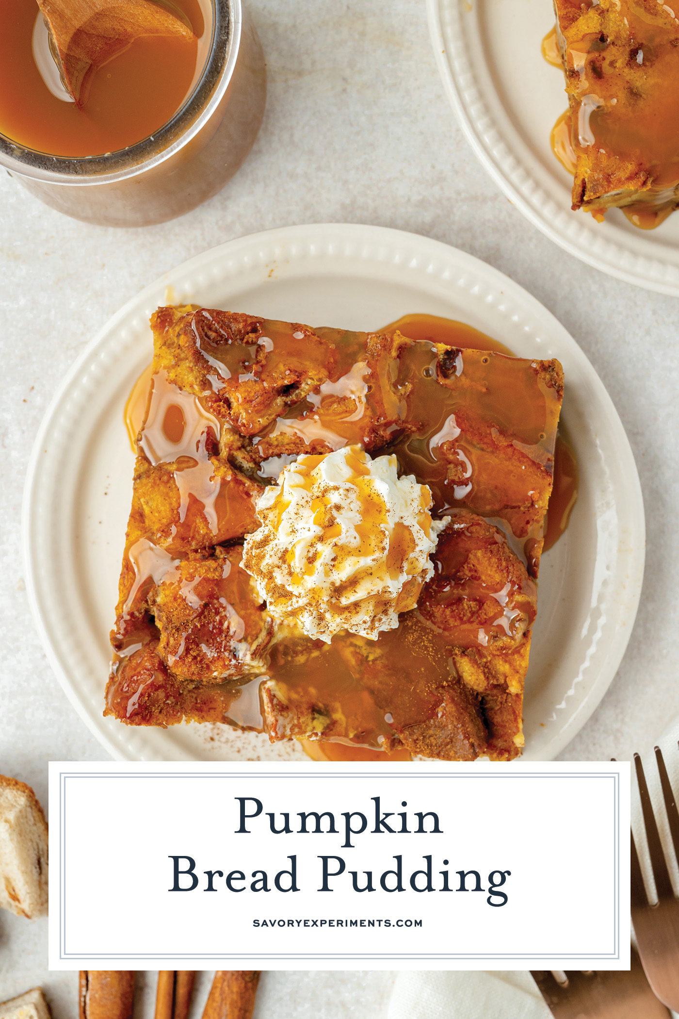 overhead shot of slice of pumpkin bread pudding topped with whipped cream and caramel with text overlay for pinterest