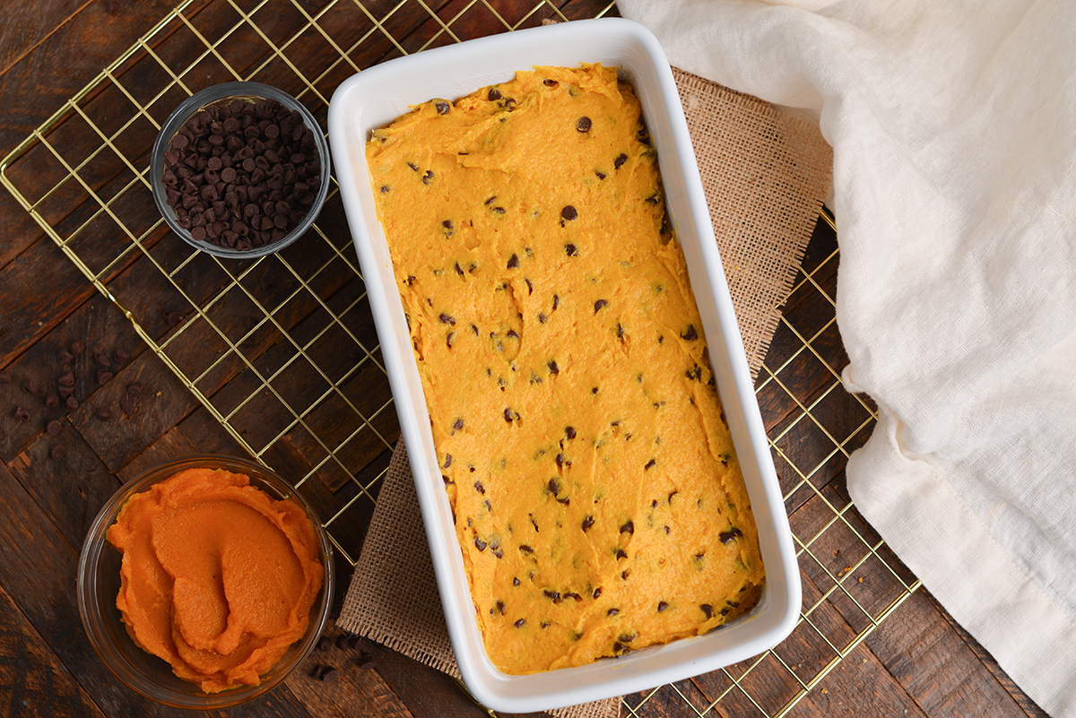 pumpkin chocolate chip bread batter in a loaf pan