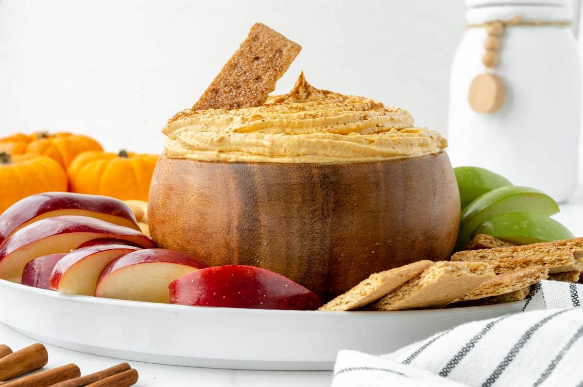 straight on shot of graham cracker in bowl of pumpkin fluff