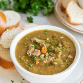 angled shot of bowl of split pea soup