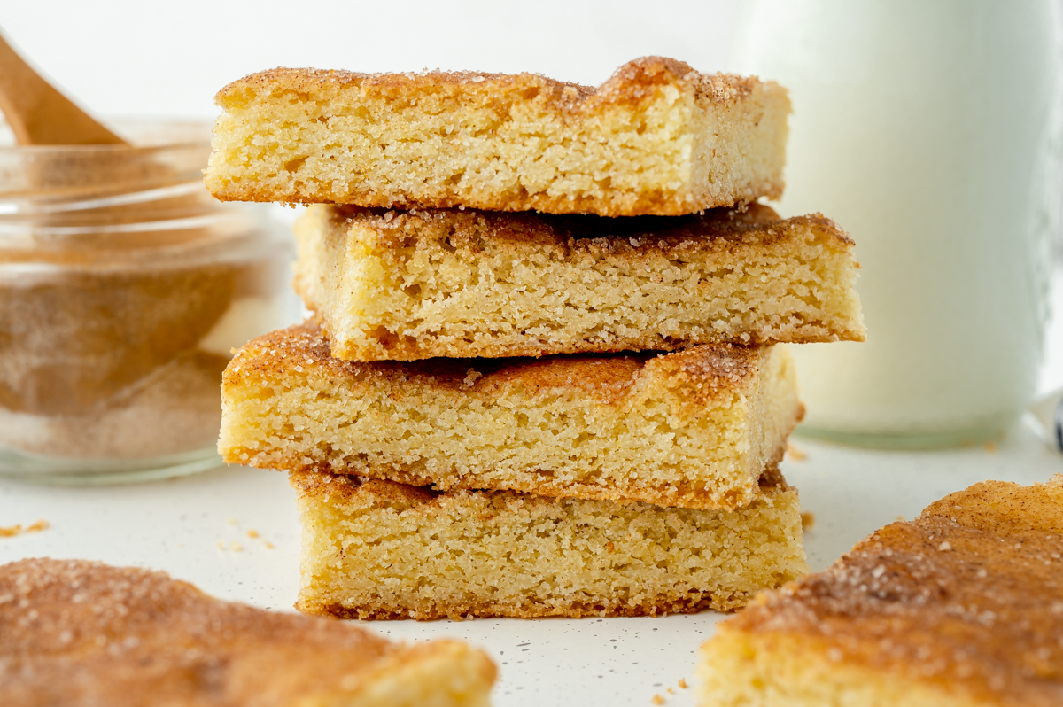 straight on shot of stack of snickerdoodle cookie bars