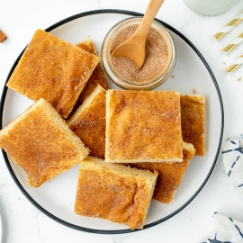 overhead shot of plate of snickerdoodle cookie bars