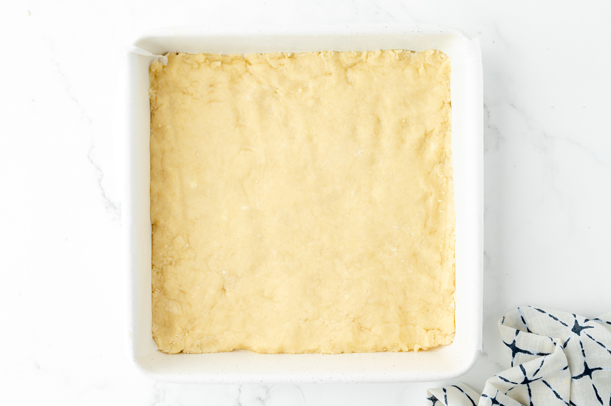 cookie dough pressed into pan