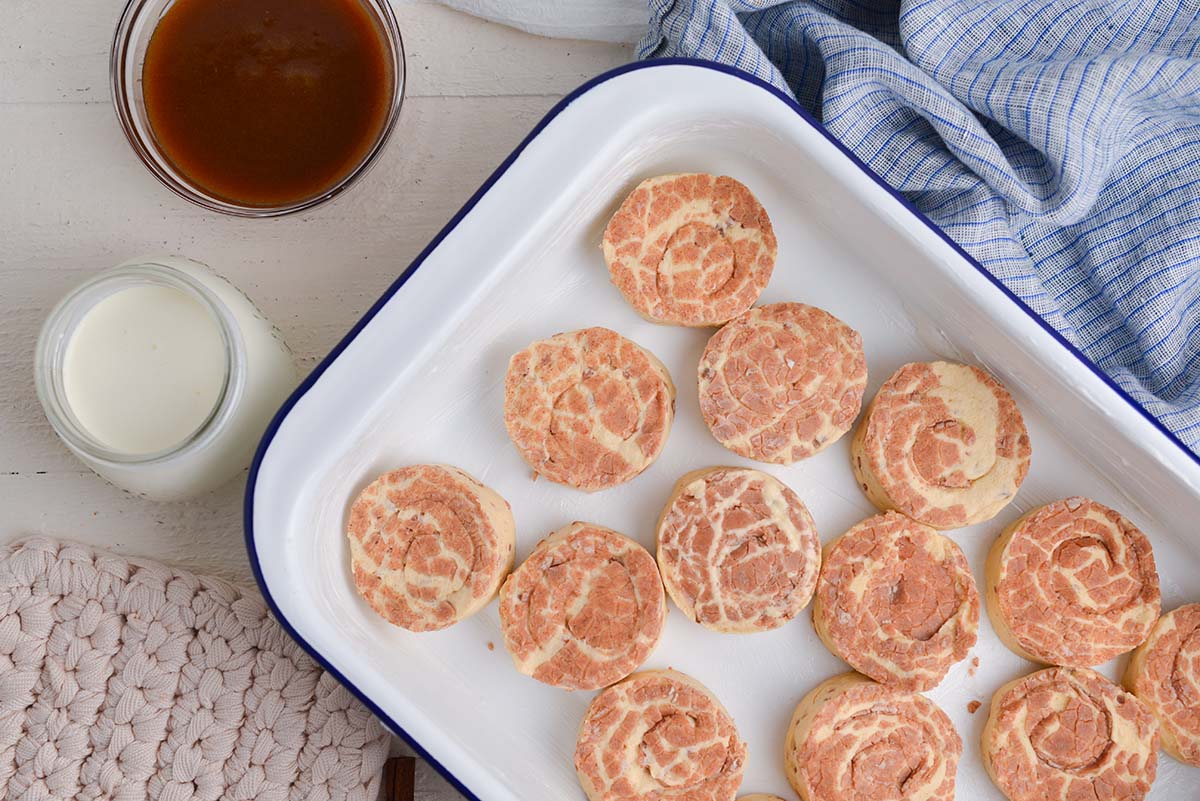 overhead shot of raw cinnamon rolls in baking dish