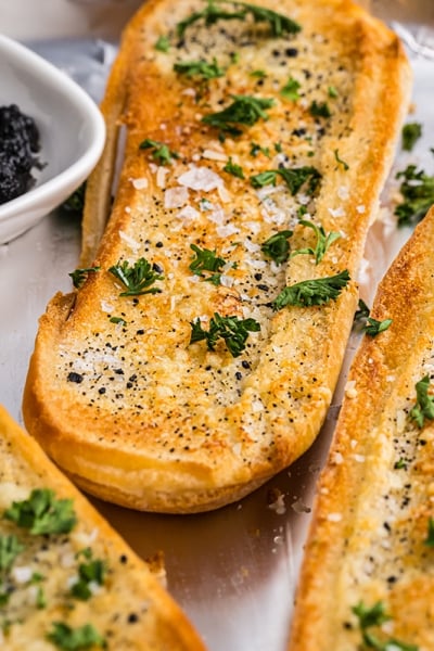 angled shot of loaves of truffle garlic bread