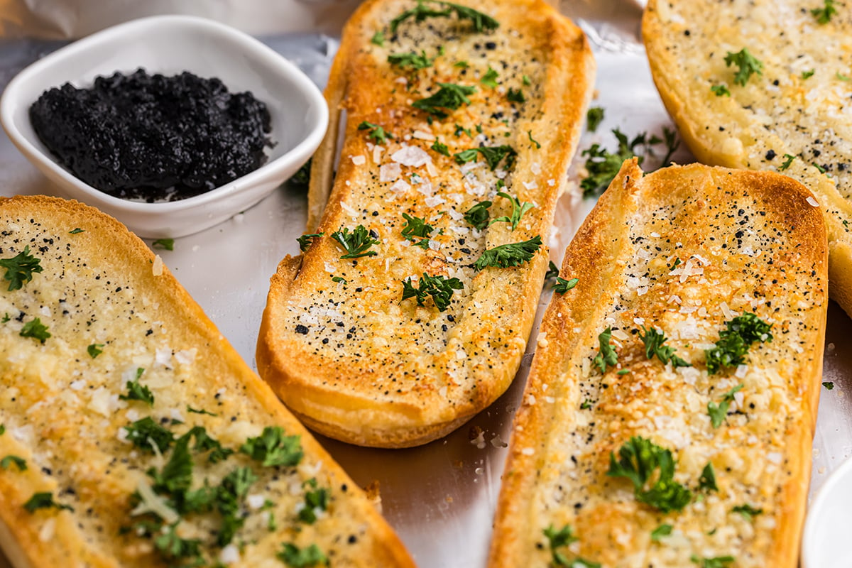 angled shot of loaves of truffle garlic bread