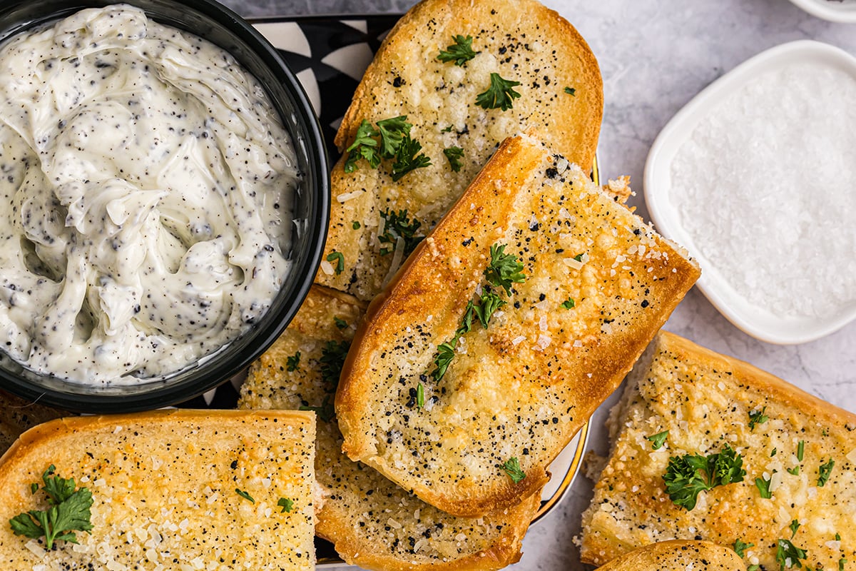 close up shot of halves of truffle garlic bread