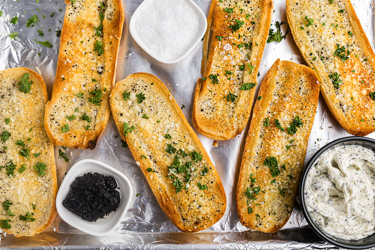 overhead shot of truffle garlic bread on a sheet pan