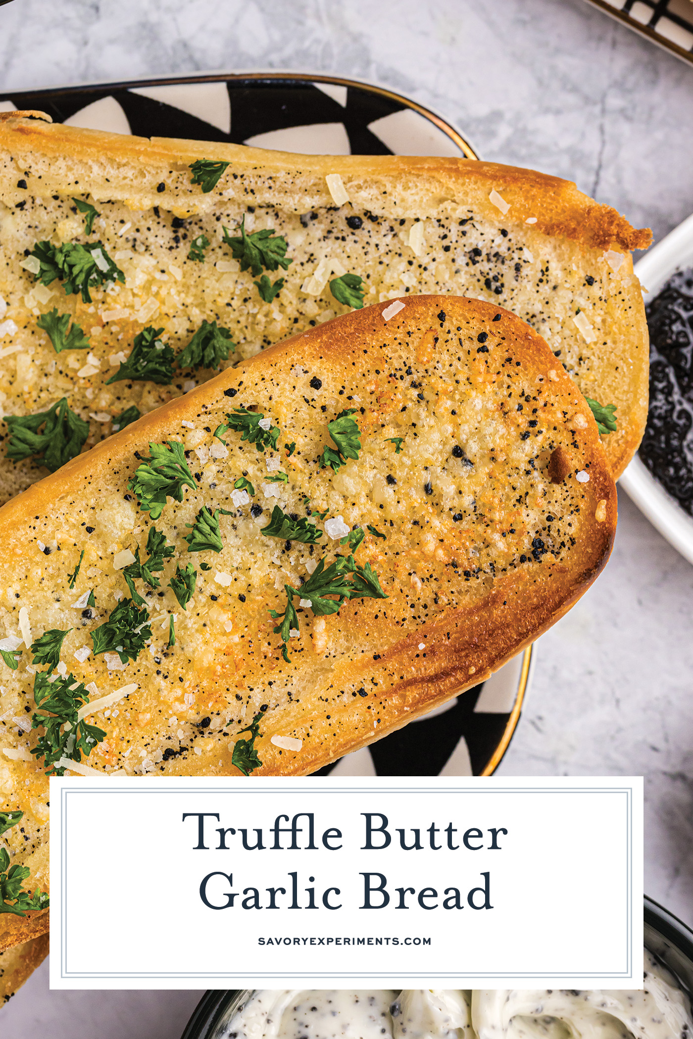overhead shot of two pieces of truffle garlic bread with text overlay for pinterest