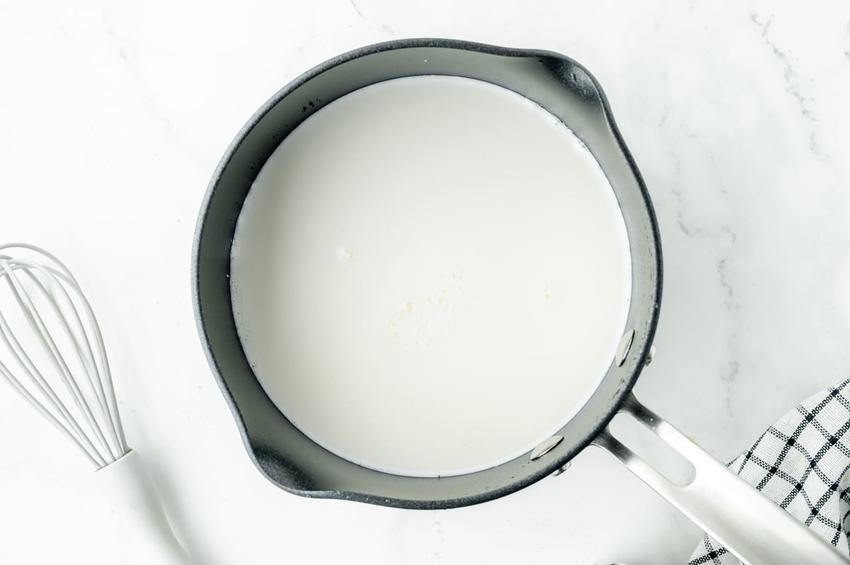 overhead shot of milk in saucepan