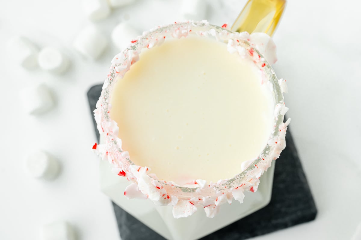 close up overhead shot of mug of white hot chocolate