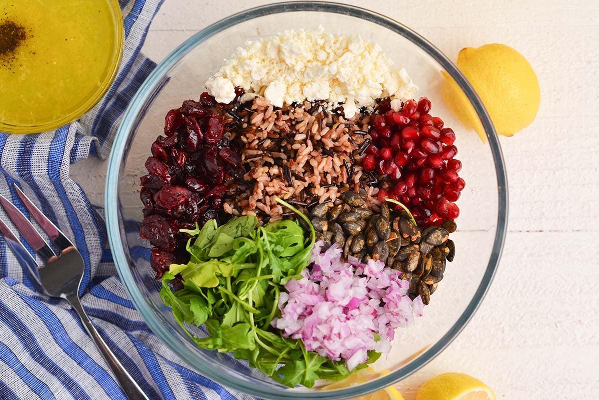 overhead shot wild rice salad ingredients in bowl