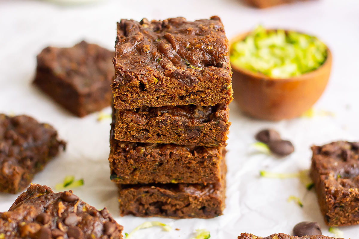 stack of four brownies made with zucchini