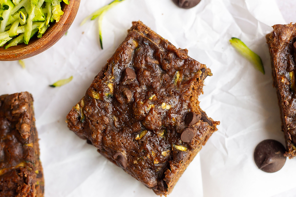 overhead bite shot of a brownie made with zucchini