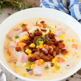 angled shot of bowl of ham and corn chowder