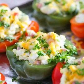 angled shot of ham and eggs stuffed peppers