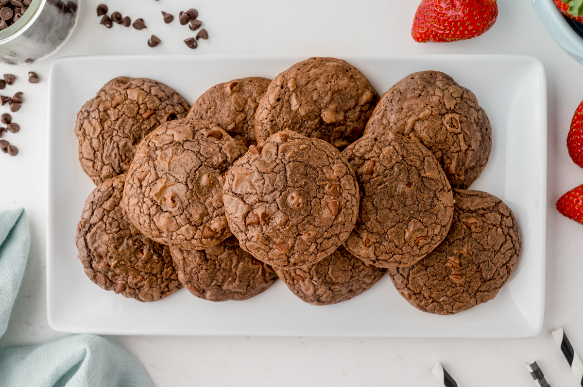 white serving platter with a pile of cookies made with brownie mix