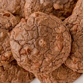super close up of crinkled chocolate cookie with chocolate chips