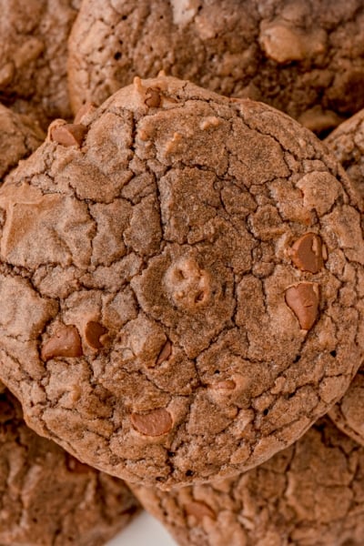 super close up of crinkled chocolate cookie with chocolate chips