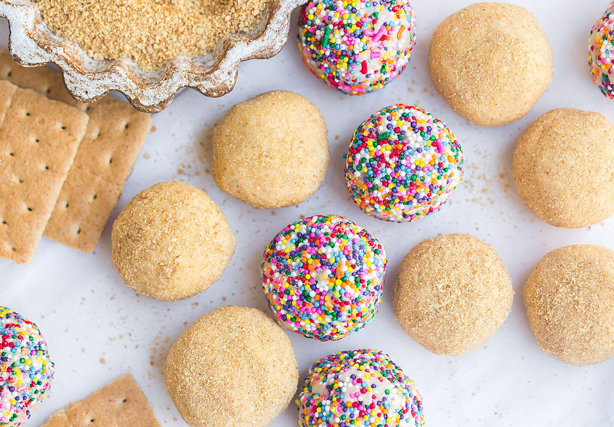 0verhead of confetti and graham cracker cheesecake balls