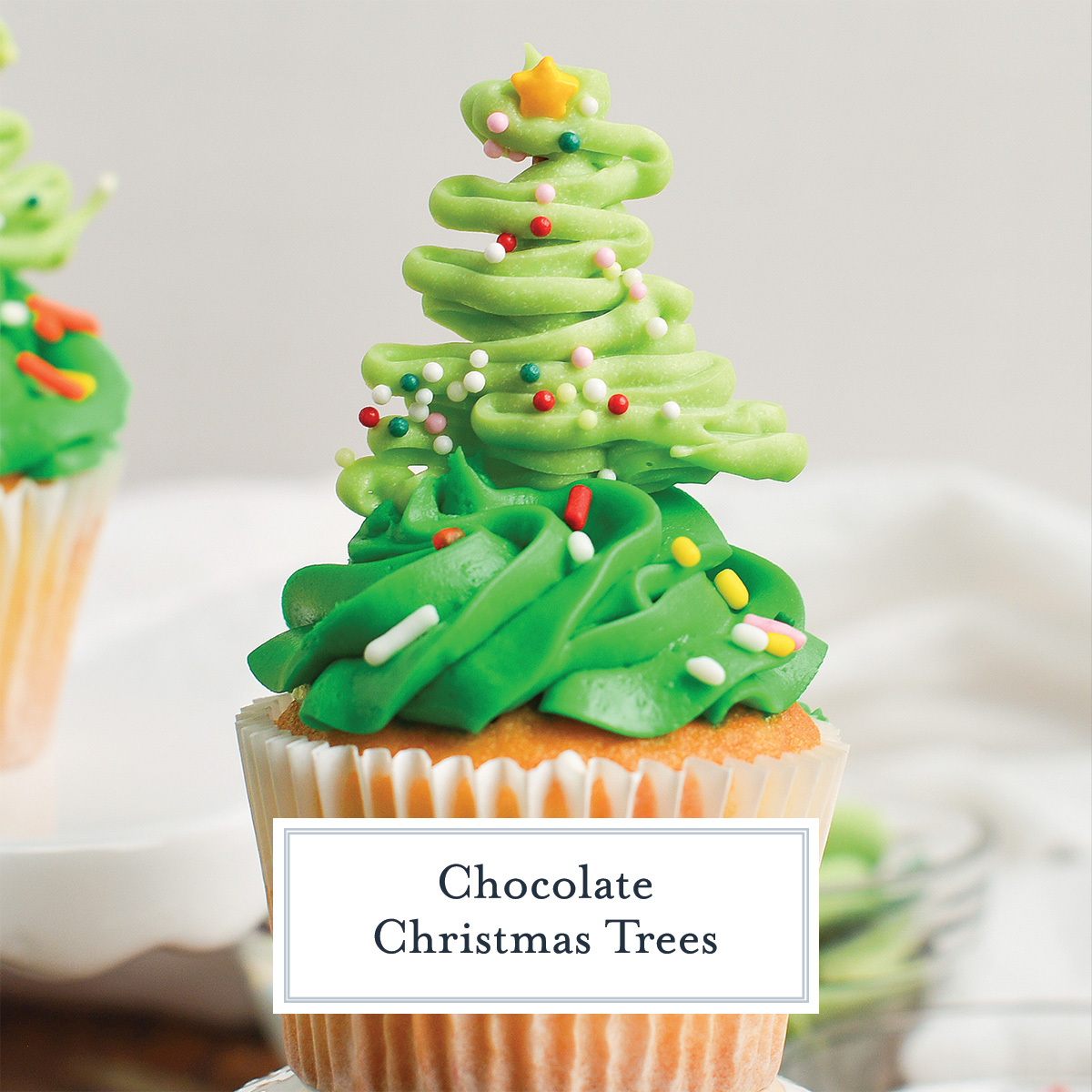 chocolate christmas tree on a cupcakes with text overlay