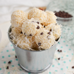 small metal bucket of coconut balls with and without chocolate chips