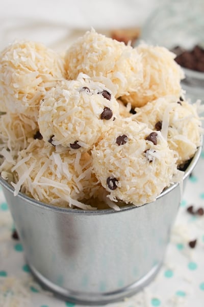 small metal bucket of coconut balls with and without chocolate chips