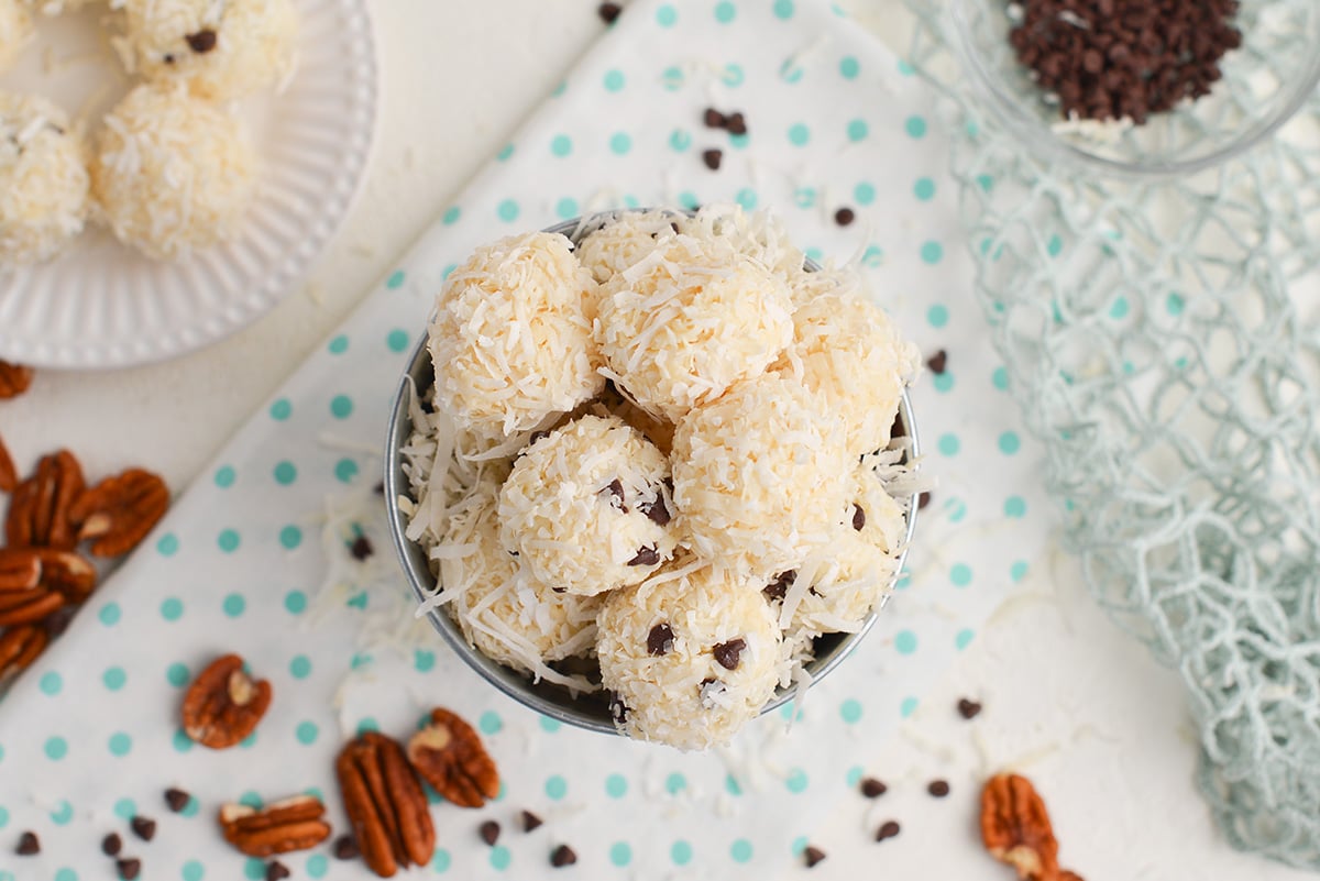 overhead of coconut balls in a metal bucket