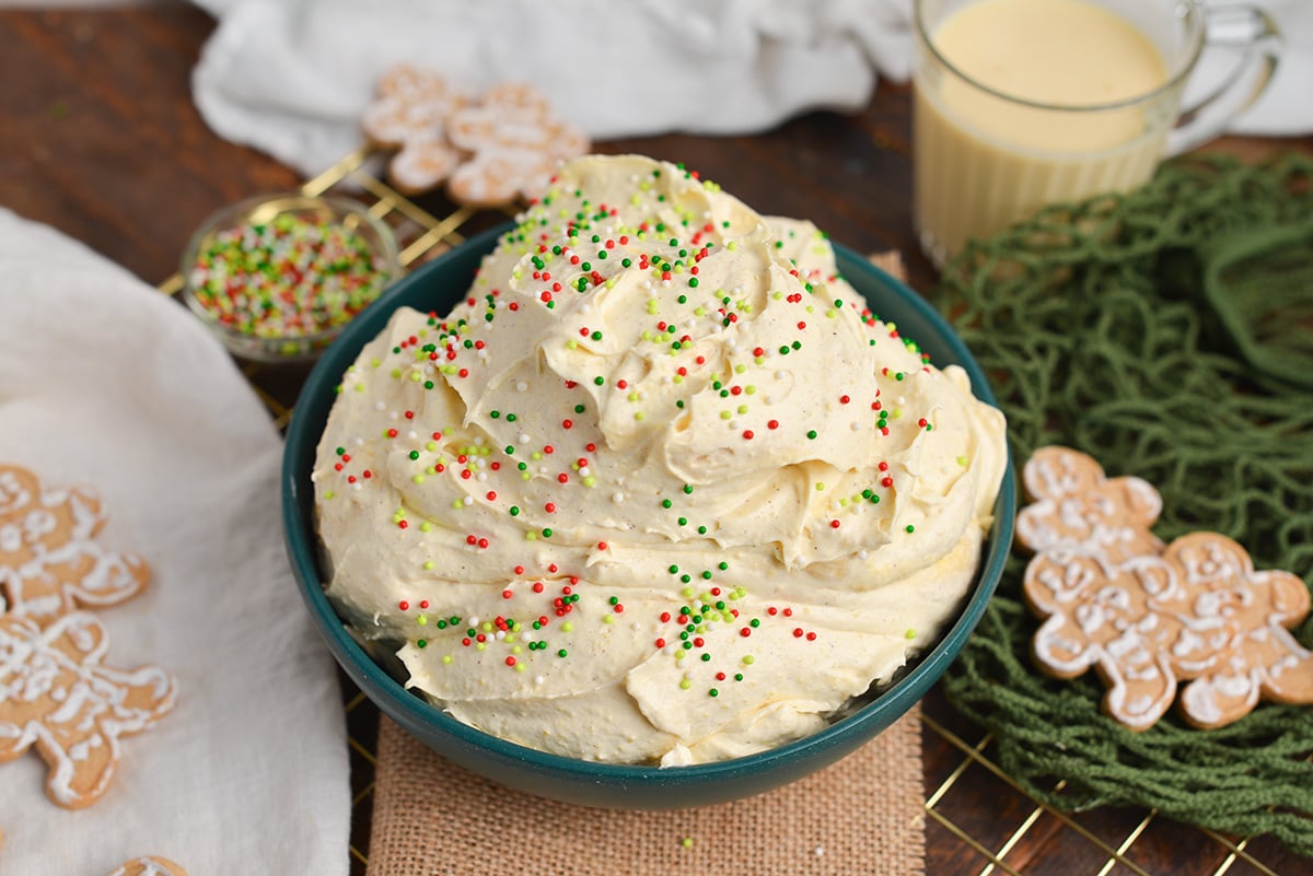 close up angled shot of eggnog dip in bowl