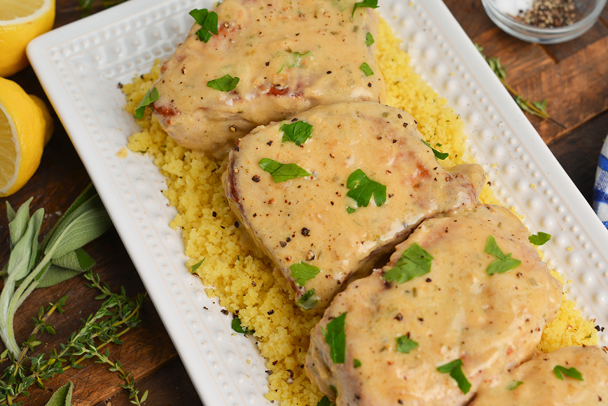 angle of pork chops on a serving platter with couscous