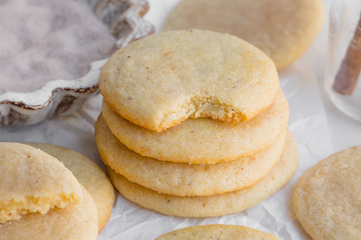 stack of old fashioned tea cakes with a tiny bite removed