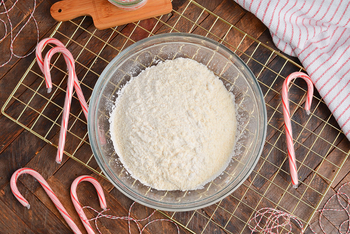 sifted almond flour and powdered sugar in a bowl